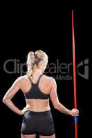 Athlete standing with javelin