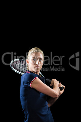 Tennis player playing tennis with a racket
