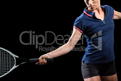 Tennis player playing tennis with a racket