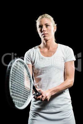 Tennis player playing tennis with a racket