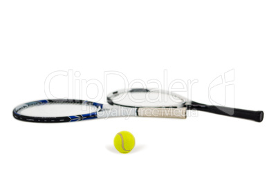 Tennis ball and rackets on white background