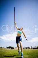 Female athlete throwing a javelin