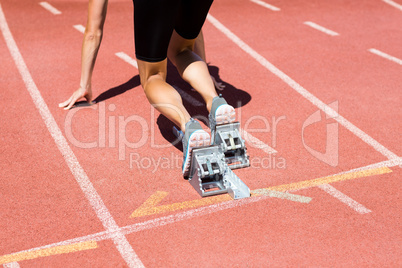 Female athlete ready to run