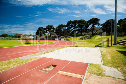 Long jump sand pit on running track