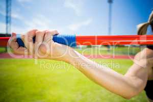 Female athlete about to throw a javelin