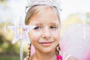 Portrait of adorable girl pretending to be a princess