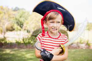 Portrait of adorable little boy pretending to be a pirate