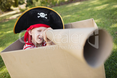 Facing view of little boy pretending to be a pirate