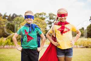 Cute children posing with hands on hips