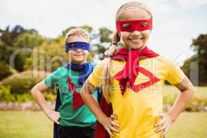 Cute children posing with hands on hips