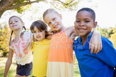 Children posing together for camera