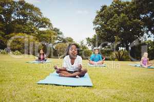 Portrait of children doing yoga