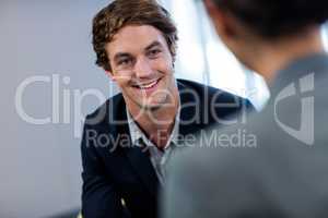 Businessman smiling and interacting