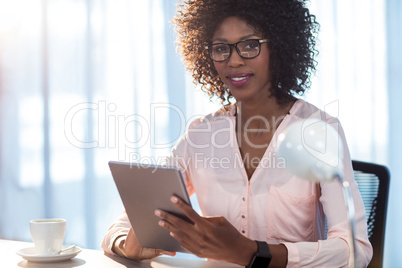 Businesswoman holding a tablet