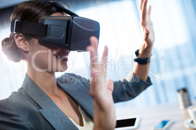 Businesswoman using an oculus