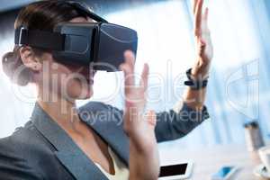 Businesswoman using an oculus