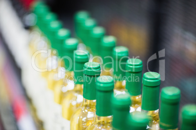 Close up of white wine bottles