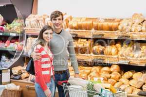 Portrait of cute couple embracing