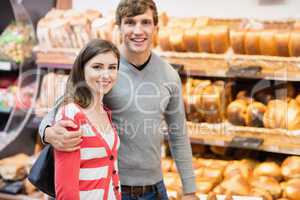 Portrait of cute couple embracing