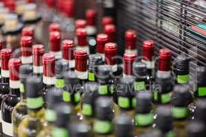 Close up of red and white wine bottles