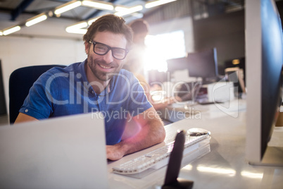 Casual businessman using computer
