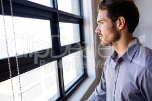 Businessman looking out of the window