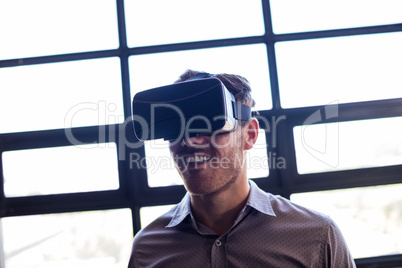 Businessman using virtual reality device