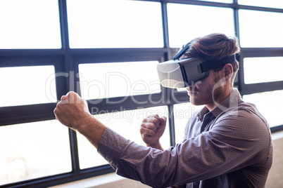 Businessman using virtual reality device