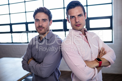 Casual businessmen with arms crossed