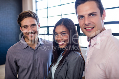 Colleagues smiling at the camera