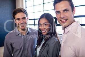 Colleagues smiling at the camera