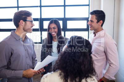 Colleagues holding a document