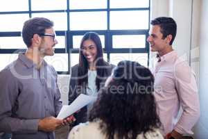 Colleagues holding a document