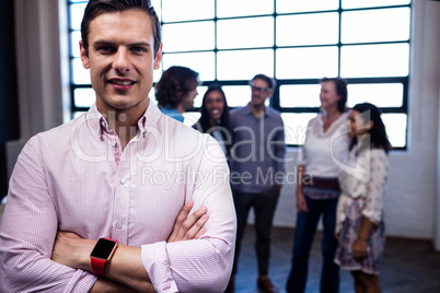 Portrait of a hipster and group of coworkers