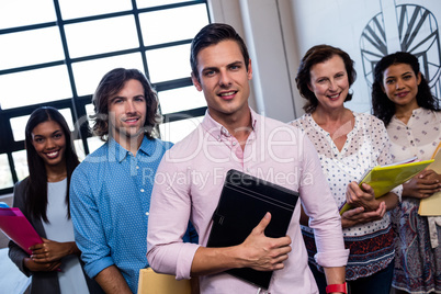 Group of coworkers with folders