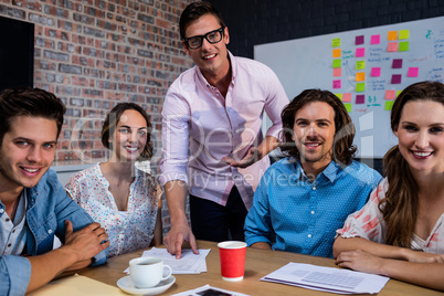 Portrait of a group of coworkers during meeting