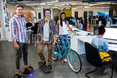 Hipsters with bicycle, skate and smart board