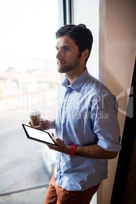 Designer using a tablet computer