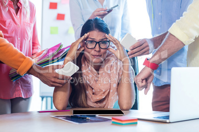 Overbooked businesswoman