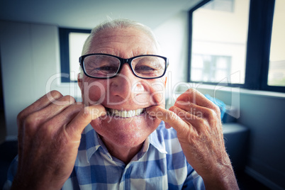 Senior man making a funny face