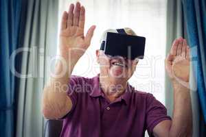 Senior man wearing virtual glasses