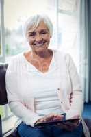 Senior woman using digital tablet