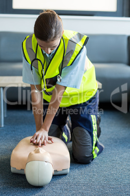 Female paramedic during cardiopulmonary resuscitation training