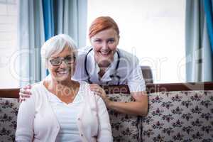 Portrait of smiling doctor and patient