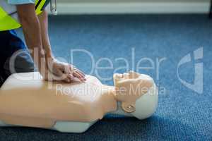 Female paramedic during cardiopulmonary resuscitation training