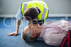 Female paramedic during cardiopulmonary resuscitation training