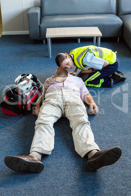 Female paramedic during cardiopulmonary resuscitation training