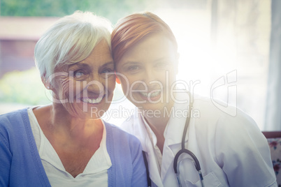 Portrait of smiling doctor and patient