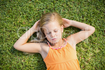 Young girl sleeping in park