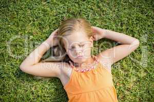 Young girl sleeping in park